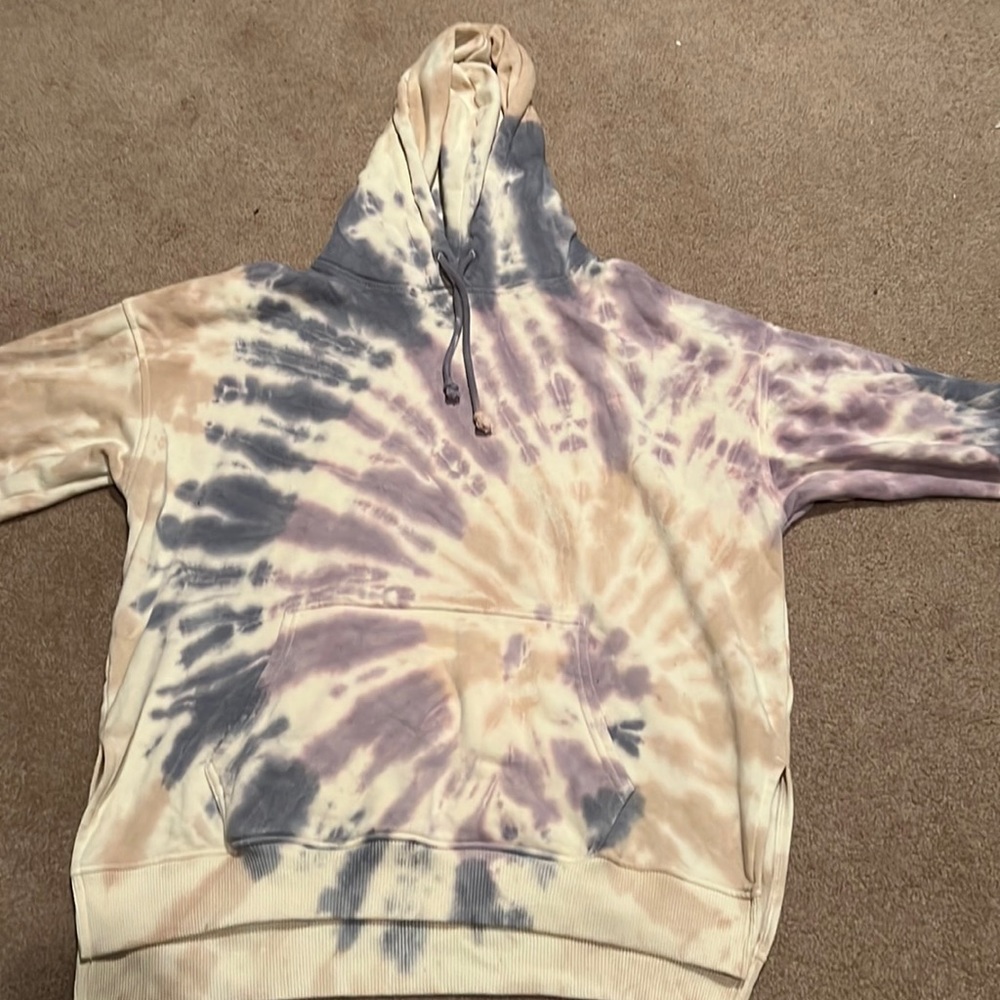 This hoodie is a size extra small but it is a oversized hoodie.